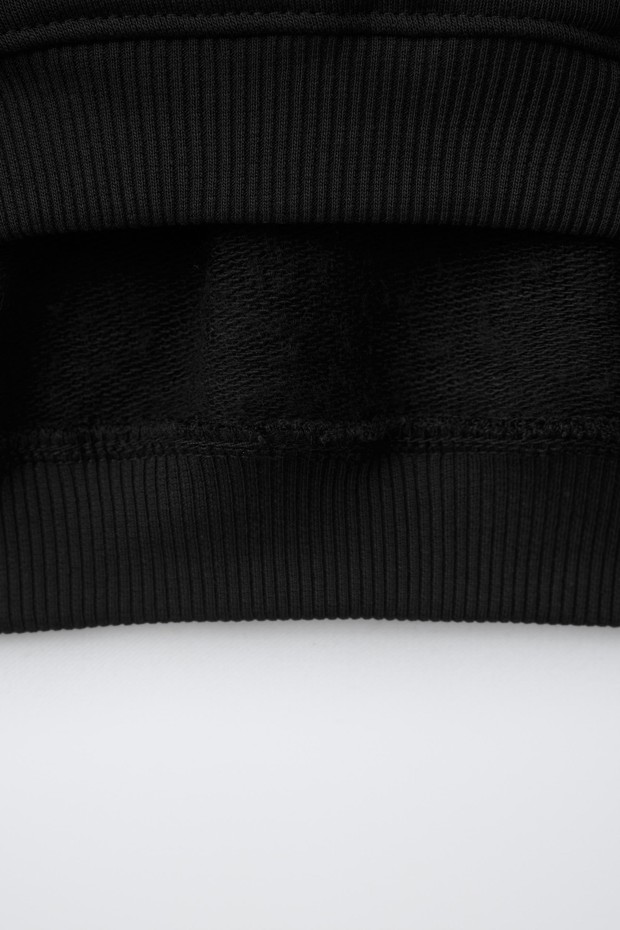 RIB TRIM SWEATSHIRT